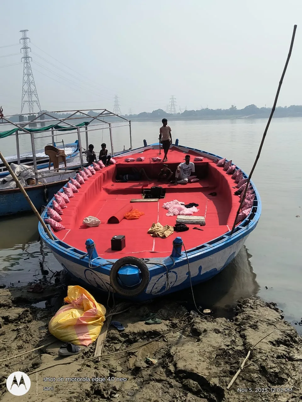 Traditional wooden boat docked on the Ganga