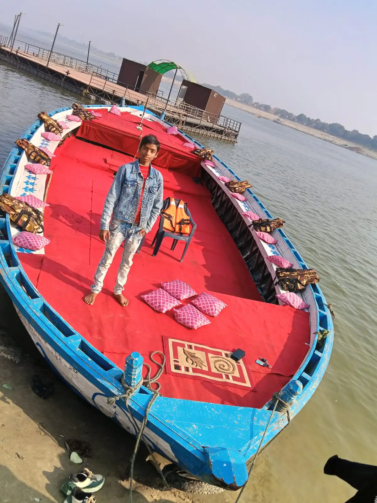 Aerial view of an empty red Ganga boat