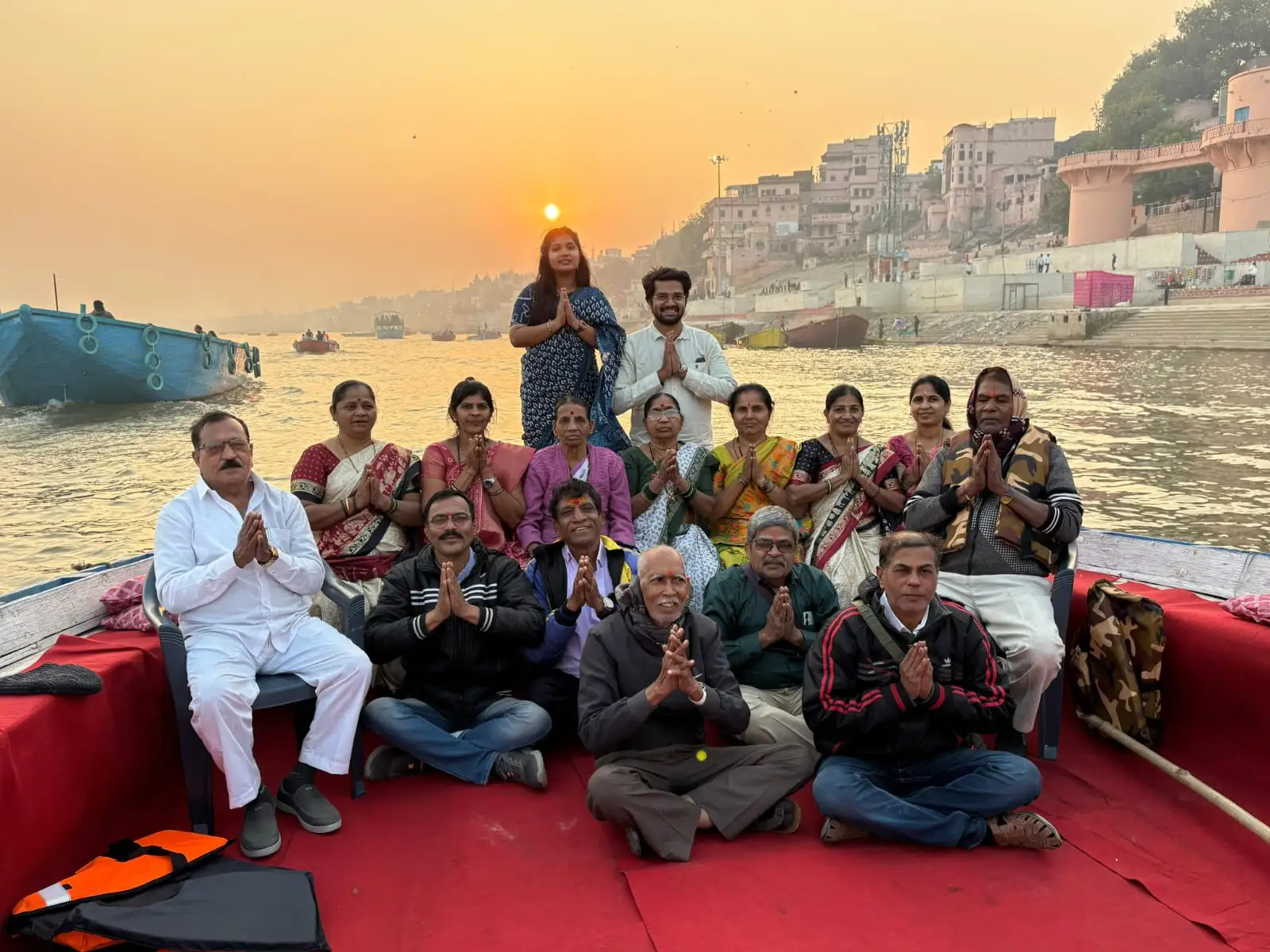 Family enjoying a Ganga boat ride at sunset in Varanasi