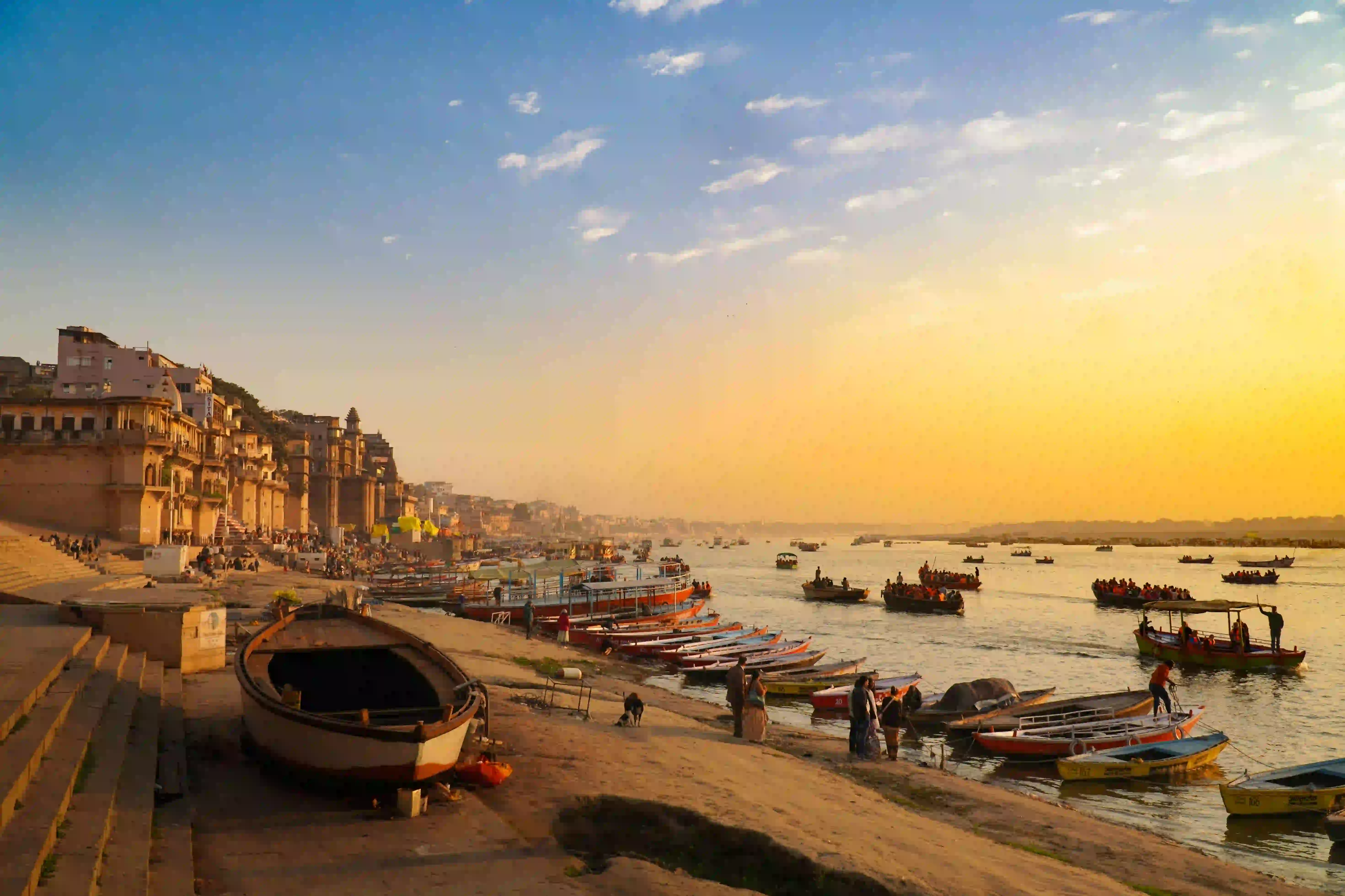 Royal decorated Ganga boat waiting at the ghat steps in Varanasi